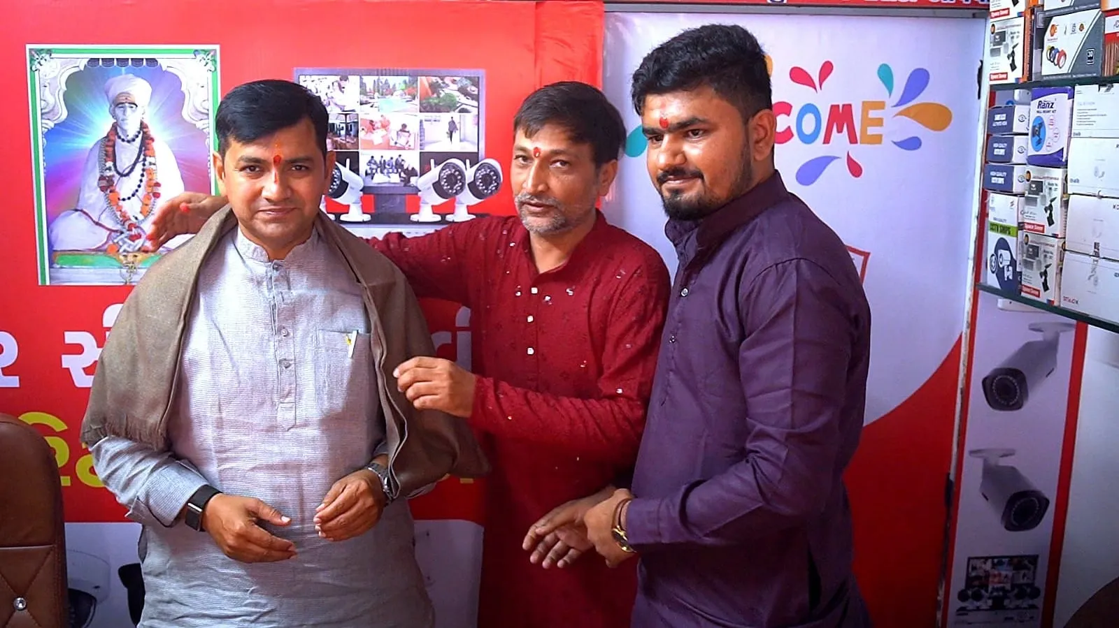 Honoured with a shawl — Kheteshwar CCTV Security Solution, Panthawada
